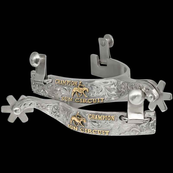 "The Lillian Smith Spurs are perfect to customize for personal use or as an award at your next event. They are hand engraved on the entire outside band and both sides of the shank. Detailed with Jewelers Bronze lettering and your choice of figure. 
